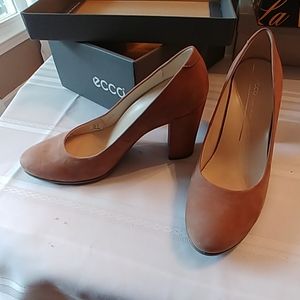 Tan suede high heel shoes